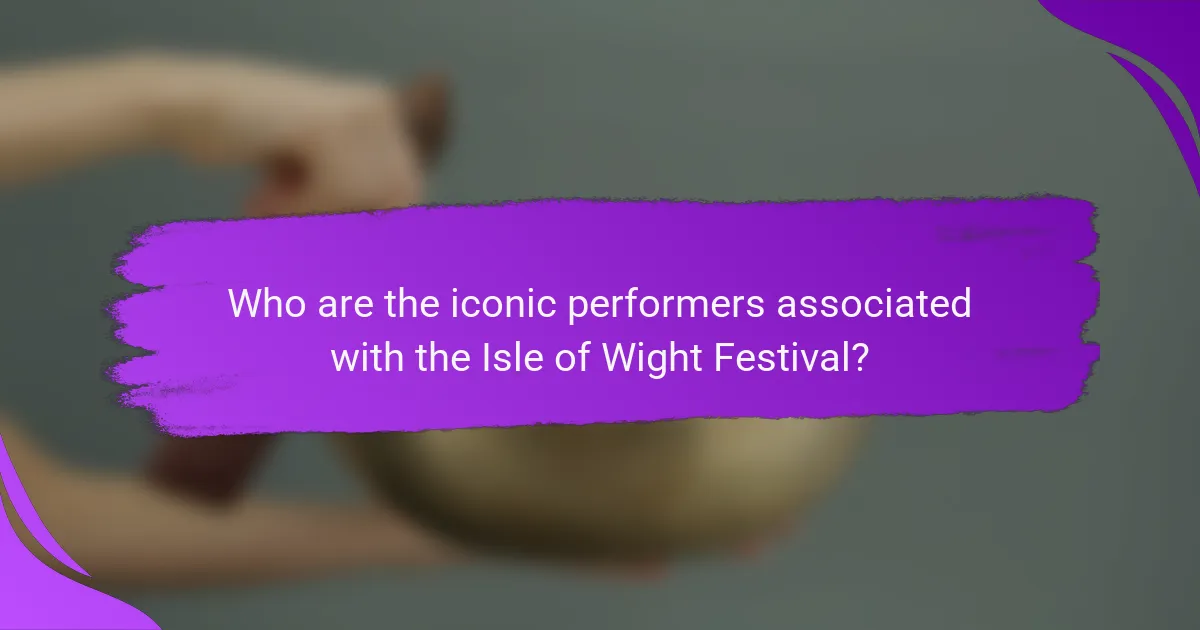Who are the iconic performers associated with the Isle of Wight Festival?